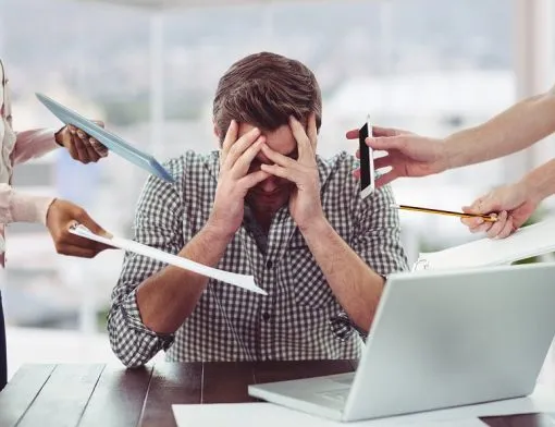 stressed-man-frustrated-with-electronic-devices
