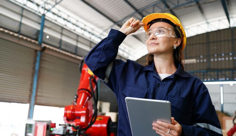 female-industrial-worker-working-with-manufacturing-equipment-in-a-factory
