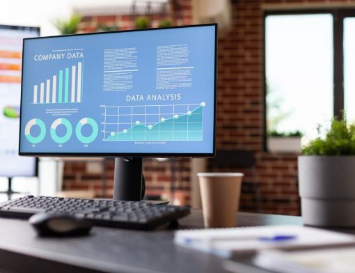 monitor-with-charts-with-annual-data-analysis-on-screen