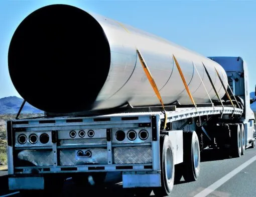 trucking-hauling-large-pipe-2022-08-01-01-23-34-utc