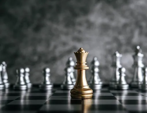 gold-and-silver-chess-on-chess-board-game-for-business-metaphor-leadership-concept