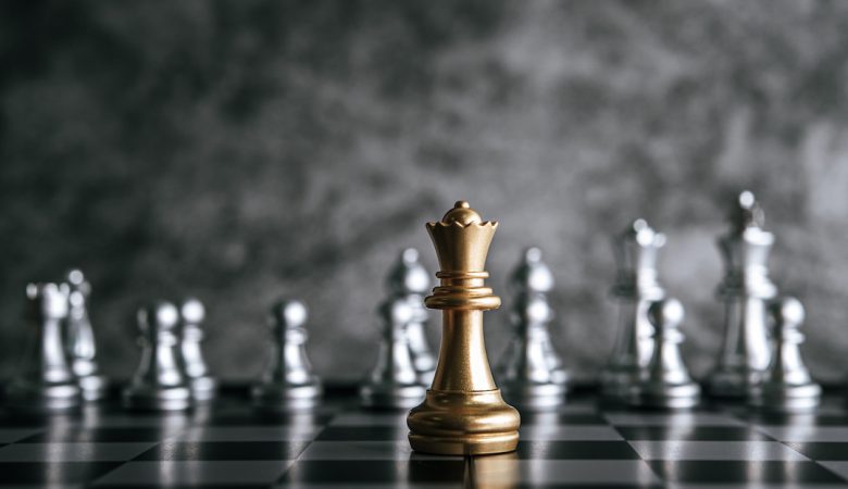 gold-and-silver-chess-on-chess-board-game-for-business-metaphor-leadership-concept