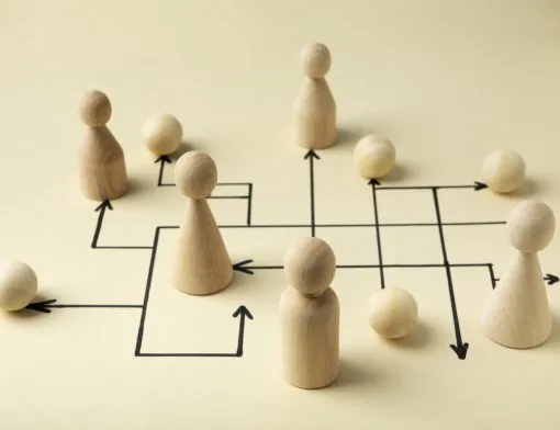 high-angle-wooden-pawns-arrangement