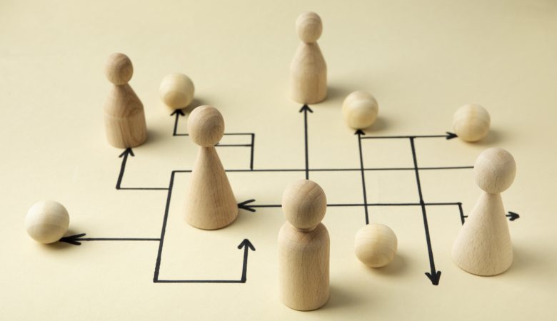 high-angle-wooden-pawns-arrangement